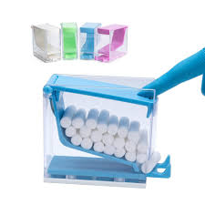 ROTATING COTTON ROLL DISPENSER